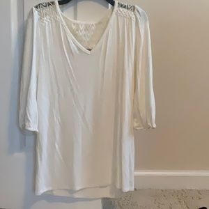 Loveappella cream top. Sleeves elbow length. Detailing on shoulders and back